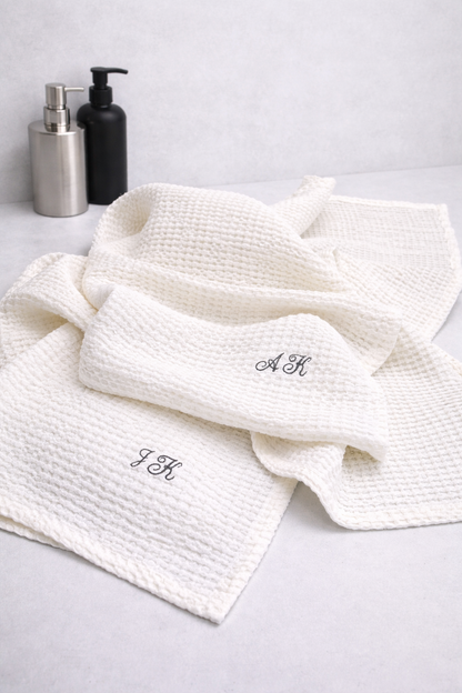 White linen cotton waffle towel with embroidered initials