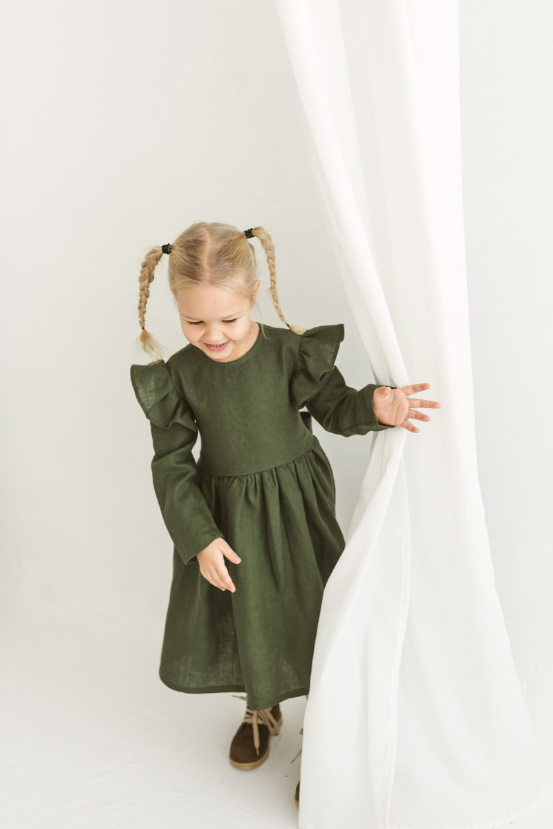 Dark green linen girls dress with ruffles