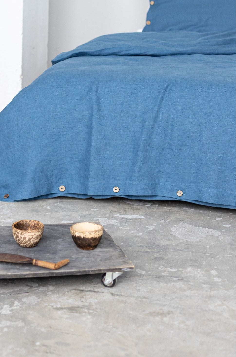 Blue linen duvet cover with buttons