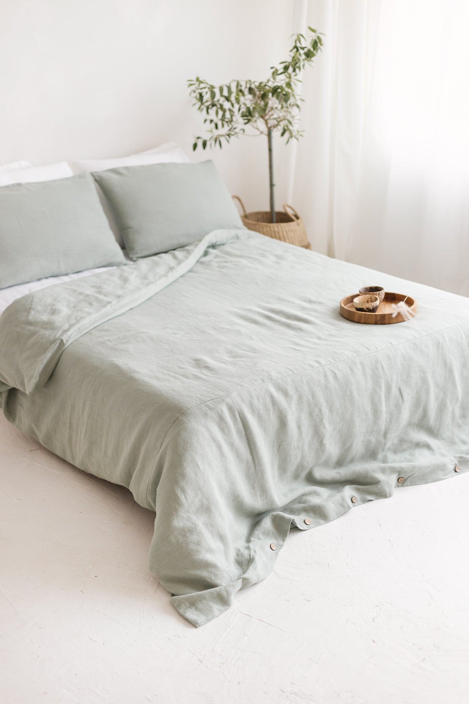 Sage linen bedding set with buttons