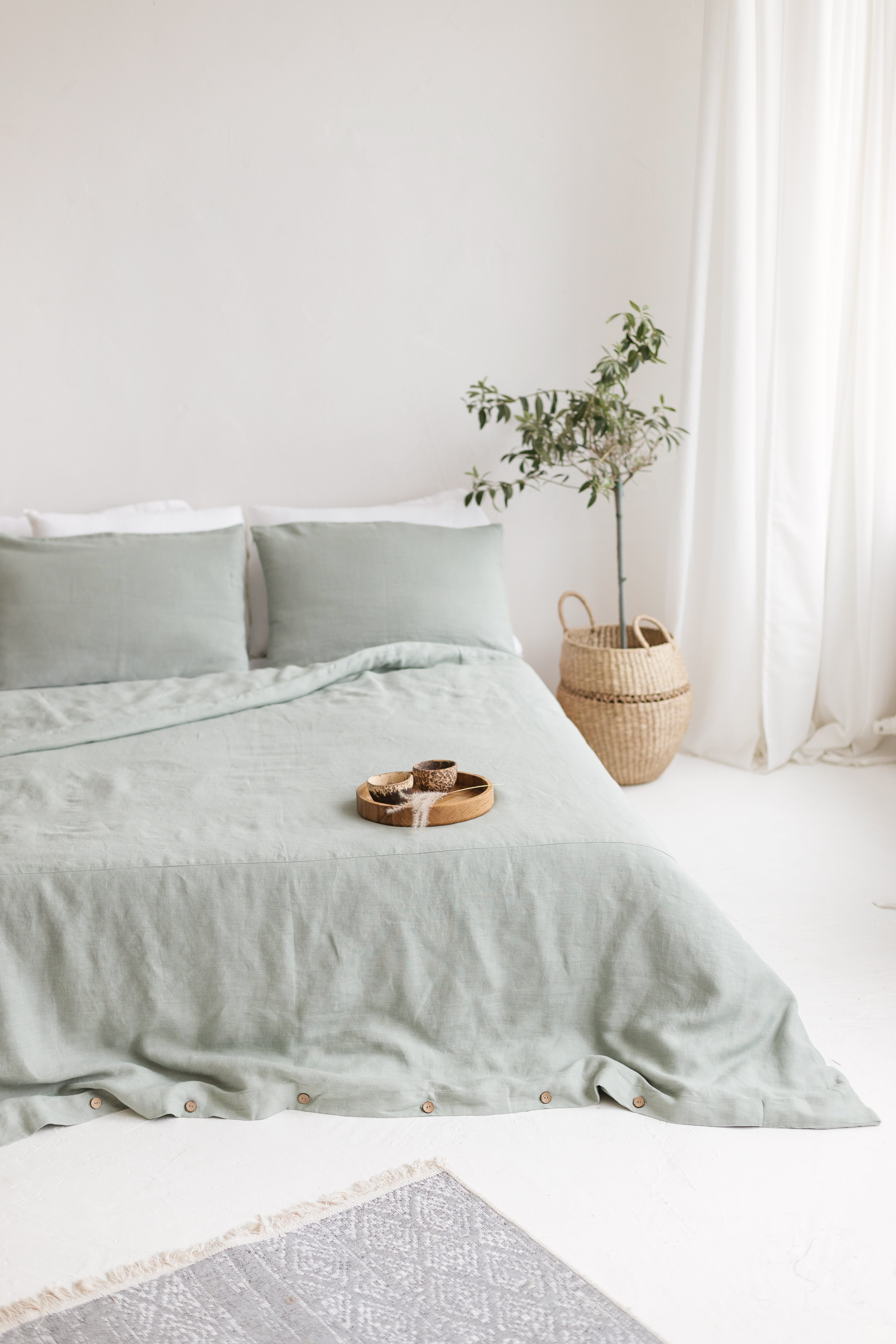 Sage linen bedding set with buttons