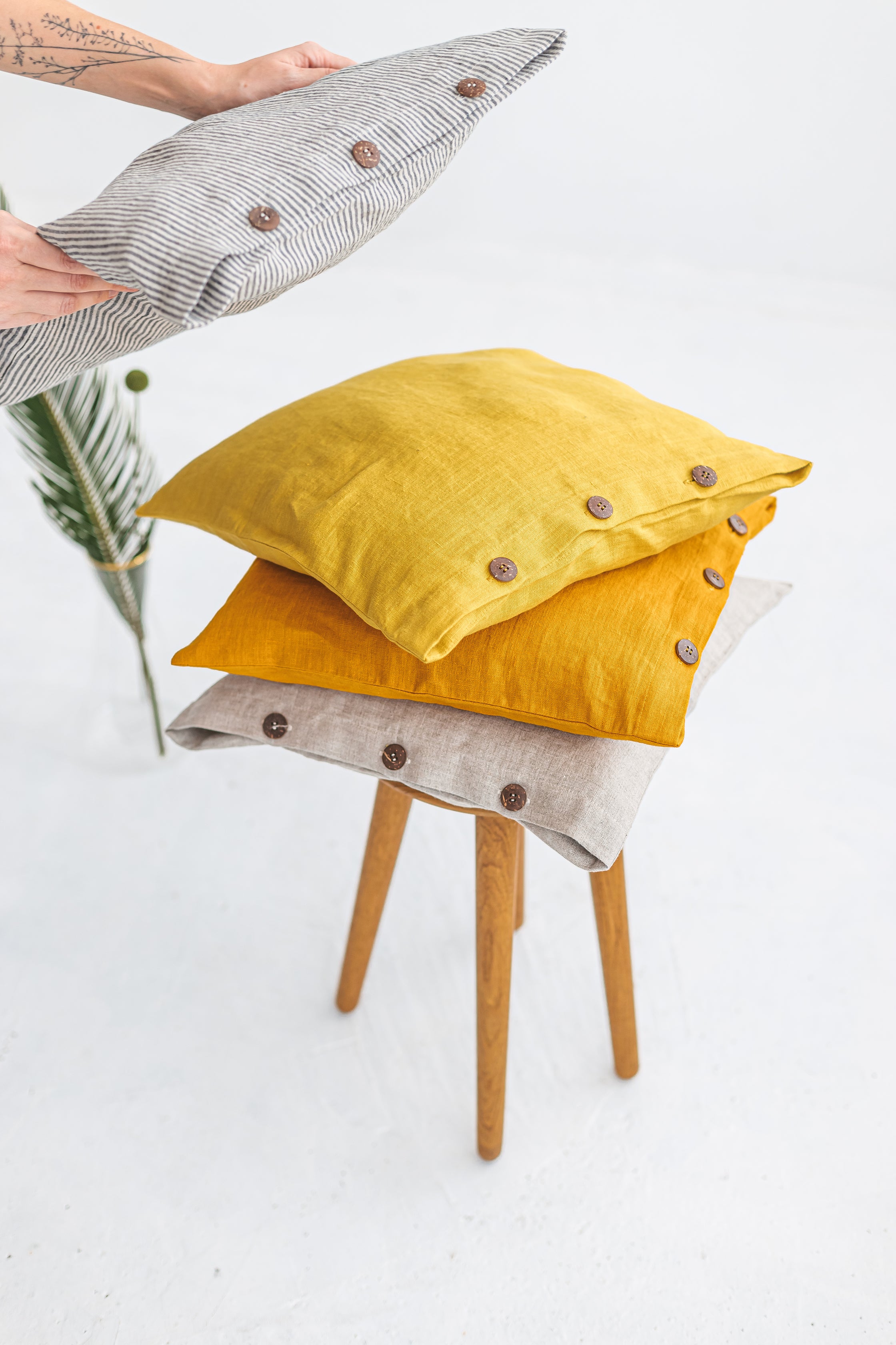 yellow linen pillow cover with buttons