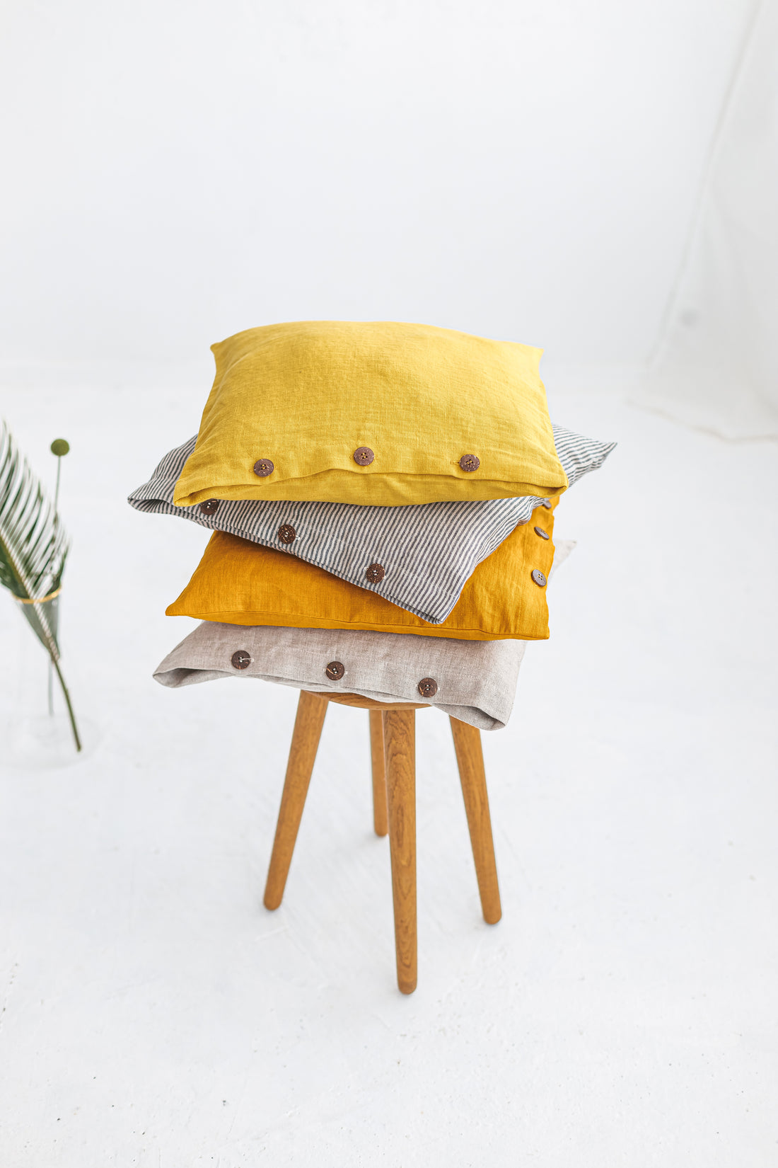 yellow linen pillow cover with buttons